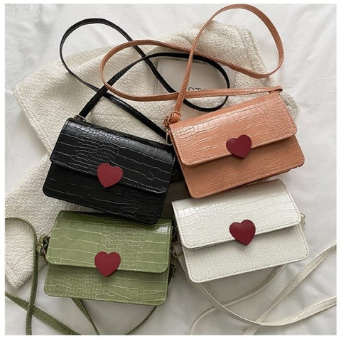 Image of Combo 2: 1 Ramo de Rosas + 1 Reloj Mariposa + Cartera Corazón ❤️